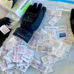 Gloves and bandages at mass vaccination event in March 2021