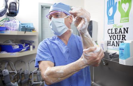Dr. Houde preparing for surgery