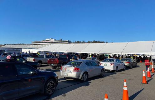 Cars lined up at the first New Hampshire mass vaccination event.