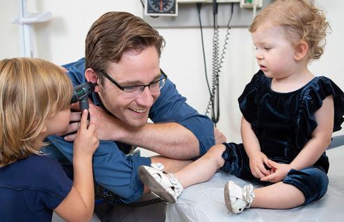 Samuel Ogden, MD, with patients