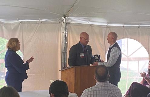 L-R, Stephen Gurin, SVP, Director of Community Banking, Bar Harbor Bank & Trust presenting the 2022 Healthcare Business of the Year award to Greg Lange, chair of APD’s Board of Trustees.