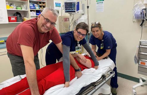 Sean Beinhaur, RN (far left) was one of MacKenzie's nurses in the ED,