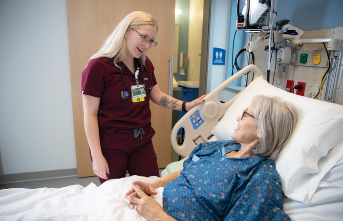 Alexis Morin, RN, pictured with a patient, is a graduate of Alice Peck Day Memorial Hospital's (APD) Nurse Residency Program.