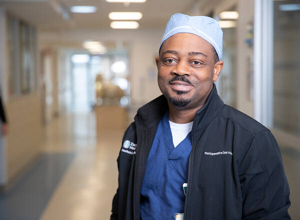 perioperative provider standing in hallway